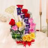 Super Dad chocolate and rose bouquet with Dairy Milk and mixed roses in red gift box