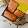 Personalized leather gift set with wallet, passport cover, keychain, and sunglass case in tan color with engraved name tags