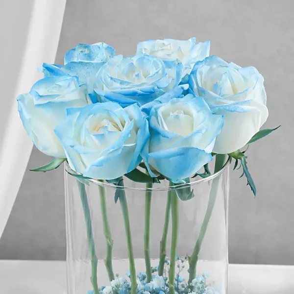 Glass vase with blue roses and baby’s breath fillers wrapped in jute – elegant floral gift for Father’s Day