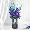Blue orchid and asparagus flower arrangement in tuxedo-themed “Best Papa Ever” vase for Father’s Day gift