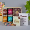 Father’s Day snacks gift hamper with roasted almonds, trail mix, brittle, and greeting card