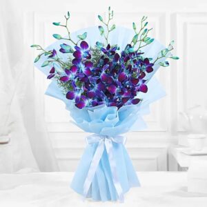 Blue orchid flower bouquet wrapped in sky-blue paper with ribbon
